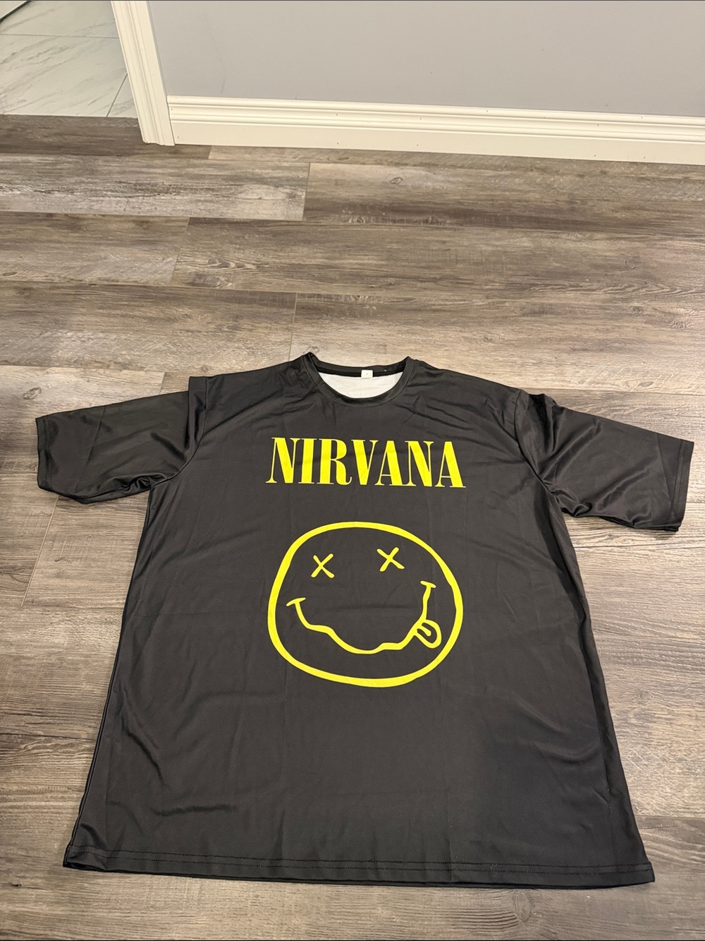 NIRVANA Black Tee with Yellow Smiley Print